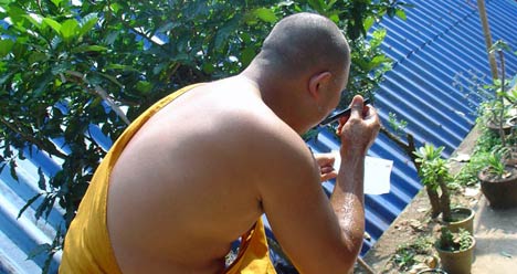 buddhist monk shaving